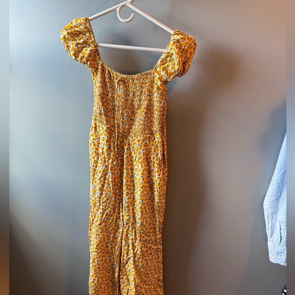 Anthropology Jumpsuit, faithful the brand. Cute yellow with floral print